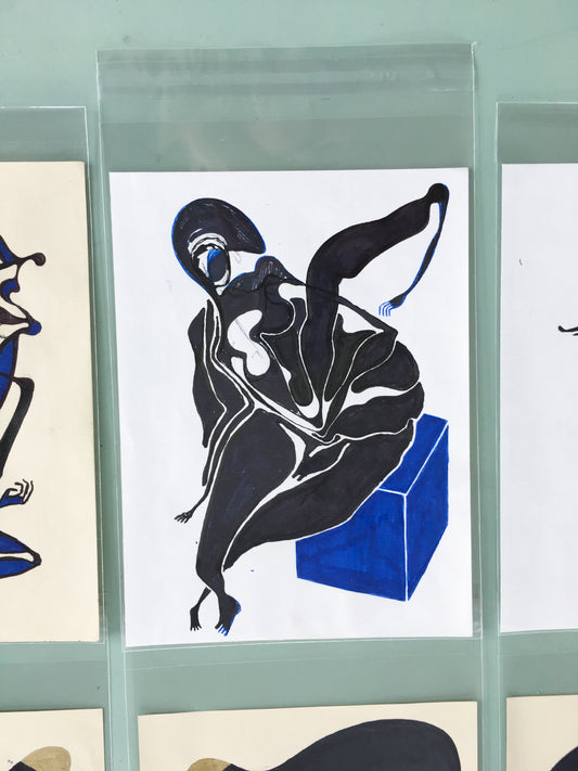 Sitting On A Blue Box